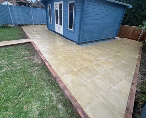 New patio with railway sleeper retainers by Grasshopper Tree and Landscapers Sileby, Loughborough