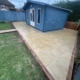 New patio with railway sleeper retainers by Grasshopper Tree and Landscapers Sileby, Loughborough